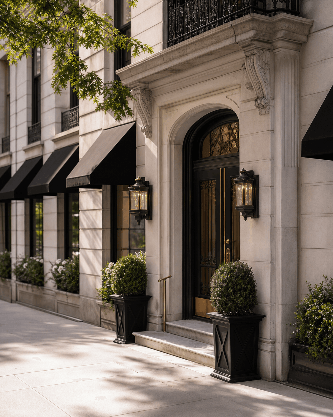 Upper East Side prewar apartment building entrance with black awnings